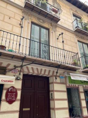 Holidays2malaga Correo Viejo next Cathedral Malaga with french balconies